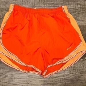 Nike orange athletic shorts size small